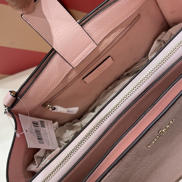 Kate Spade Brim Laptop Tote 

COLOR:
Chalk Pink - Picture 16 of 16